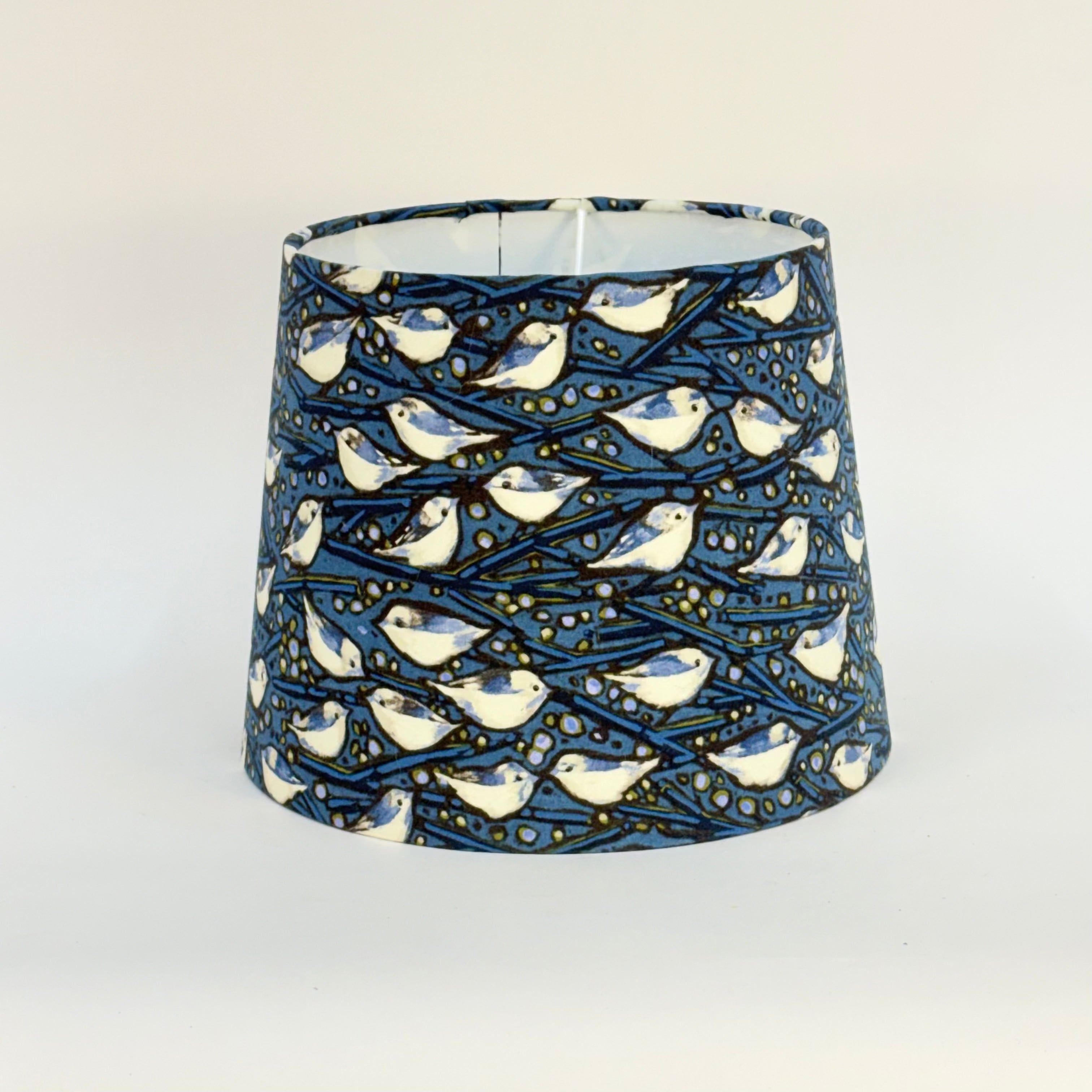 Lampshade with bird pattern on a white background