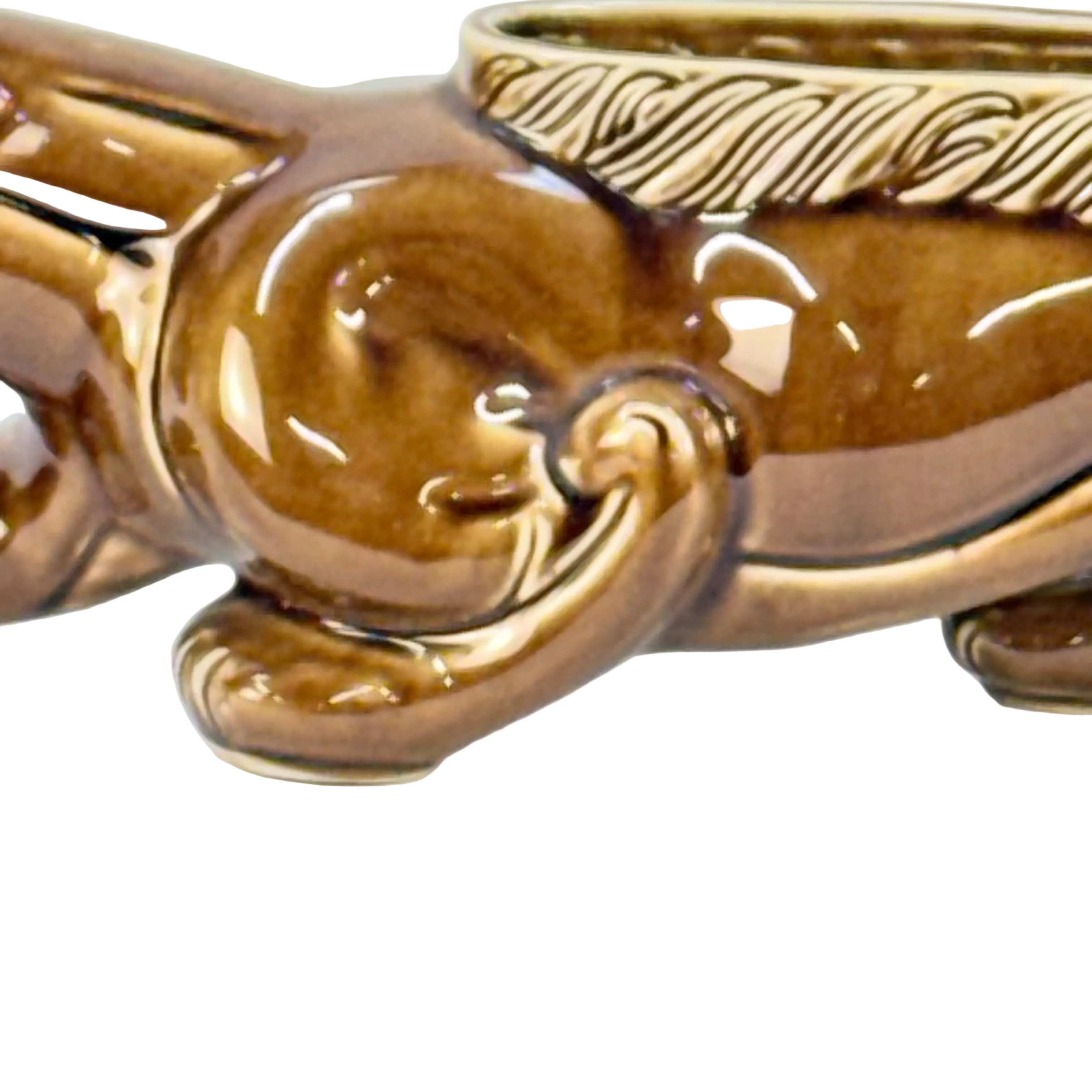 Decorative bronze handle on a white background