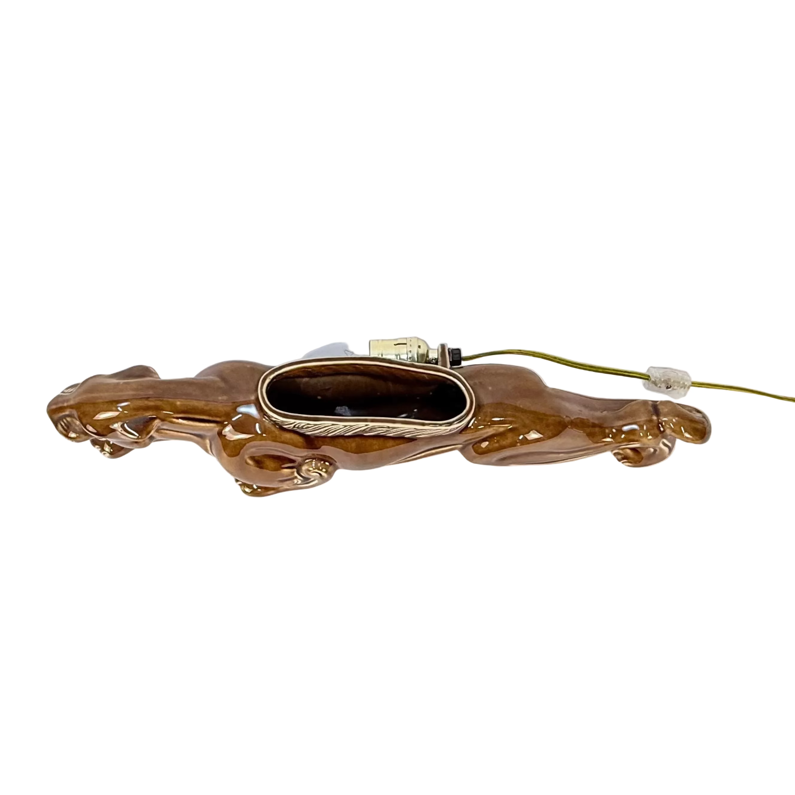 Top view of a brown panther tv lamp showing the light bulb, socket and cord.