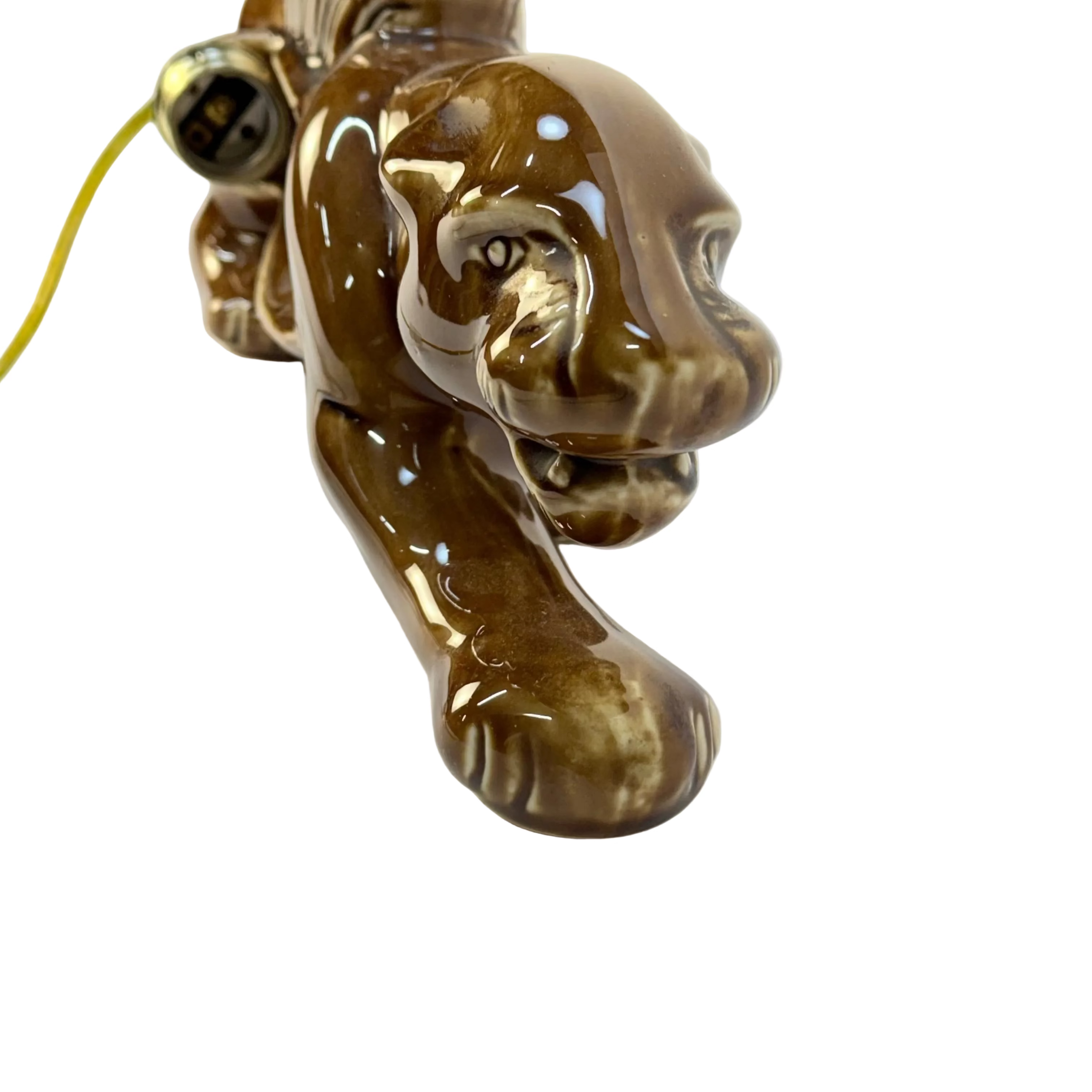 Brown monkey figurine on a white background