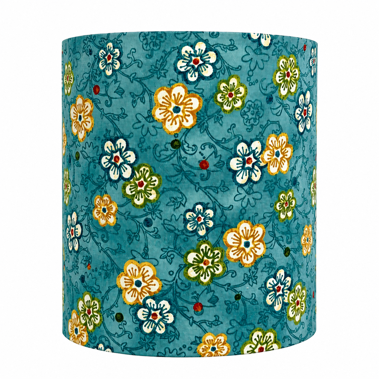 A cylindrical lampshade featuring a vibrant teal blue background with a hand-painted style floral pattern in yellow, white, green, and small red accents.