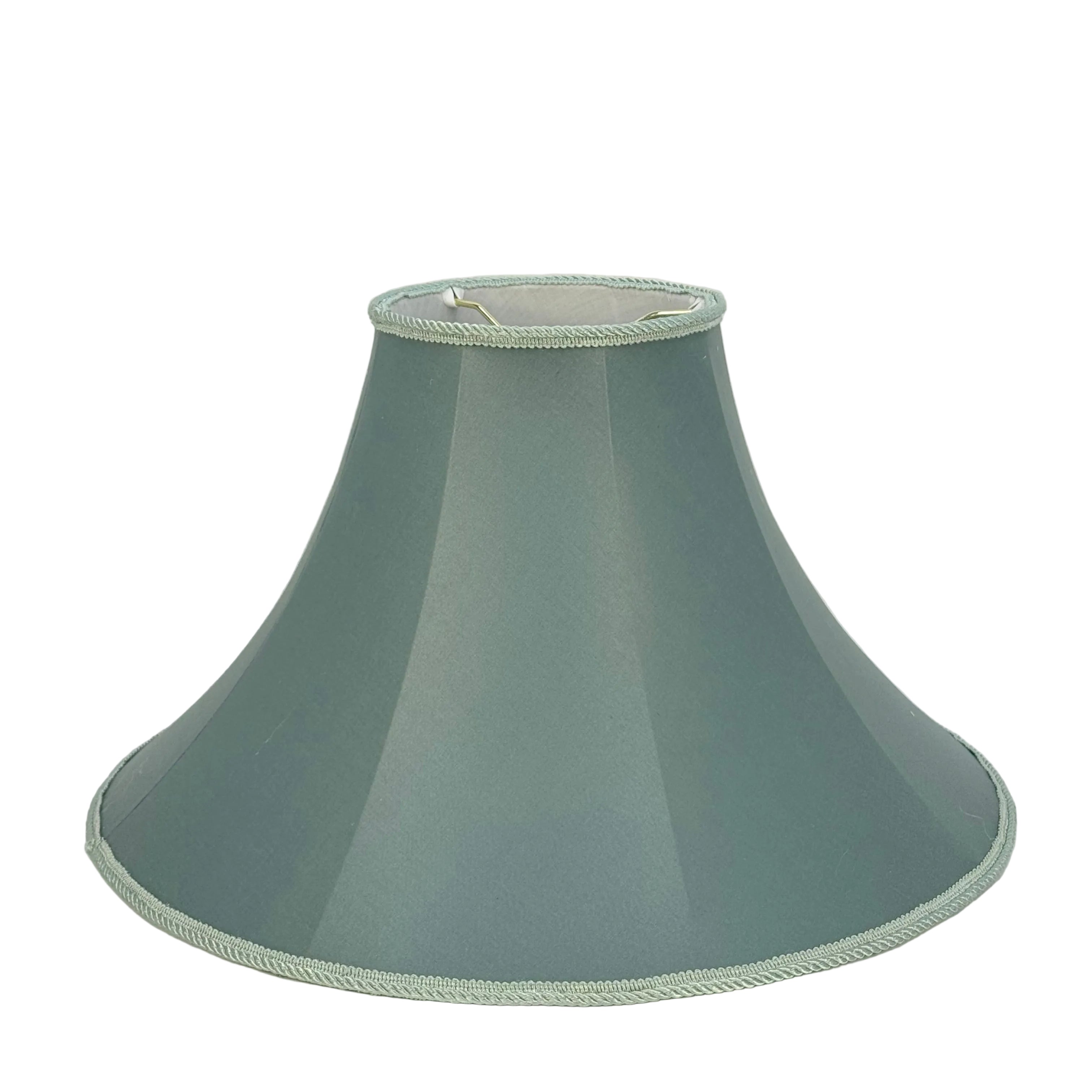 Green lampshade with a light green trim on a white background