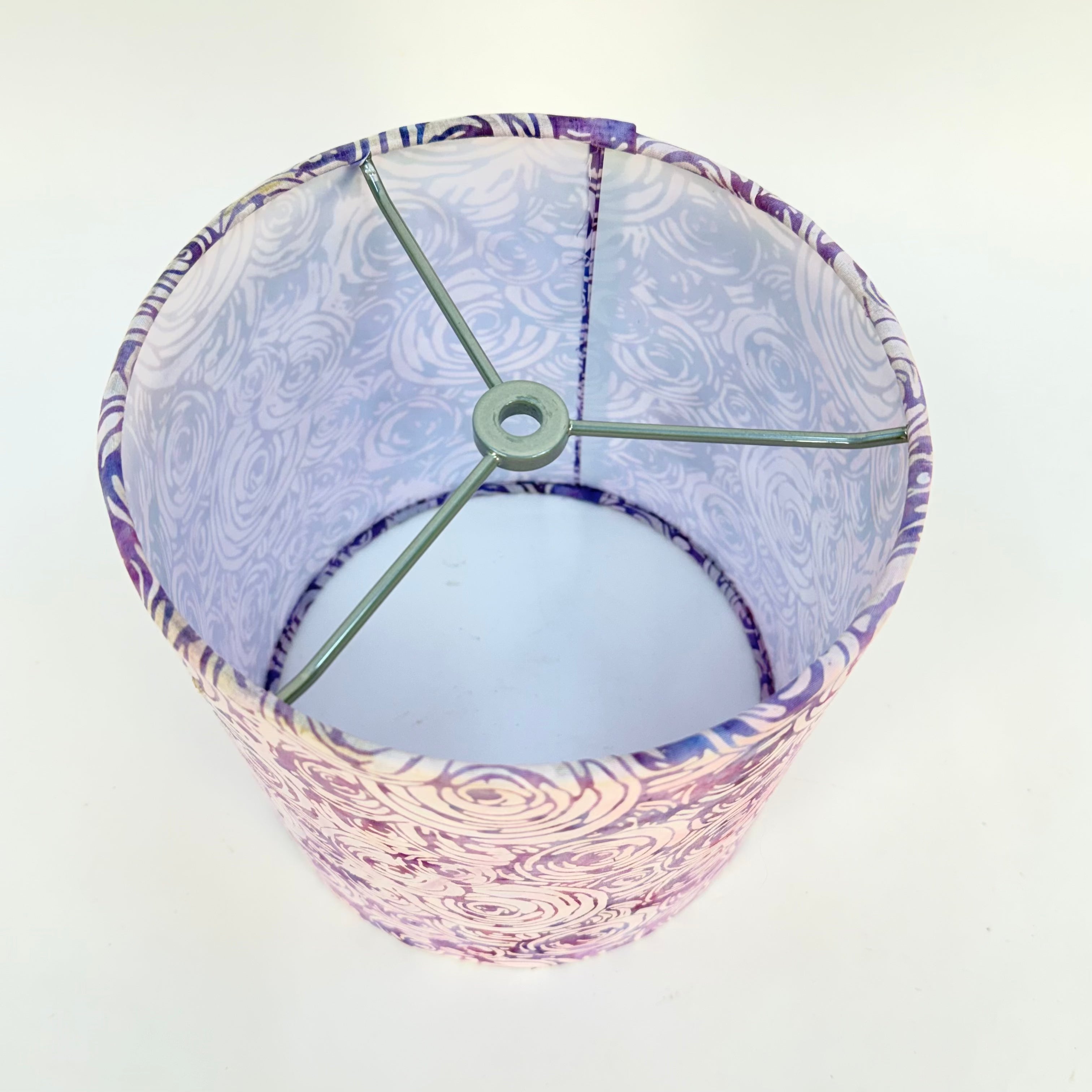 Lampshade with purple and white pattern on a white background