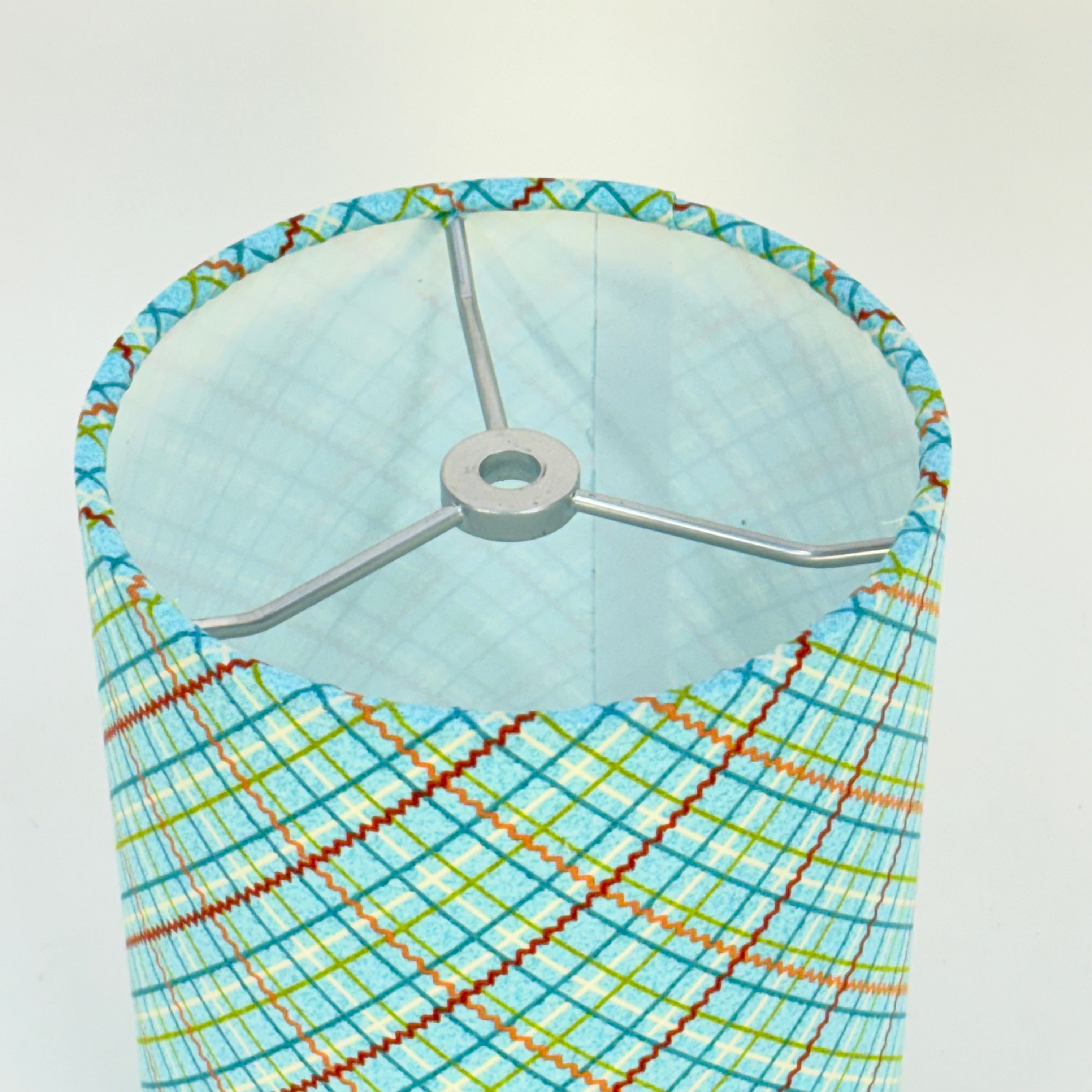 Decorative headboard with geometric pattern on a white background