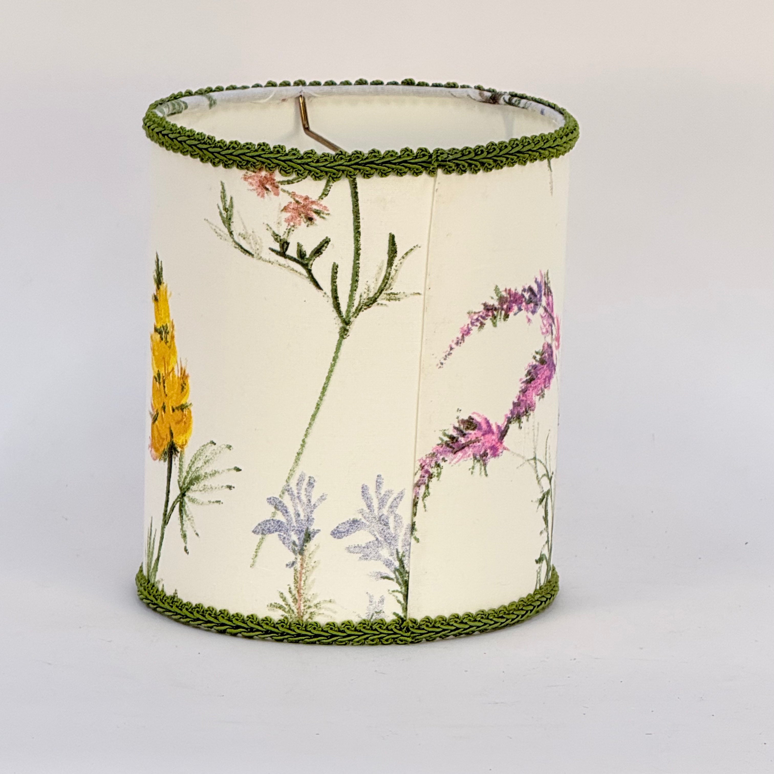 Decorative lampshade with floral patterns on a white background