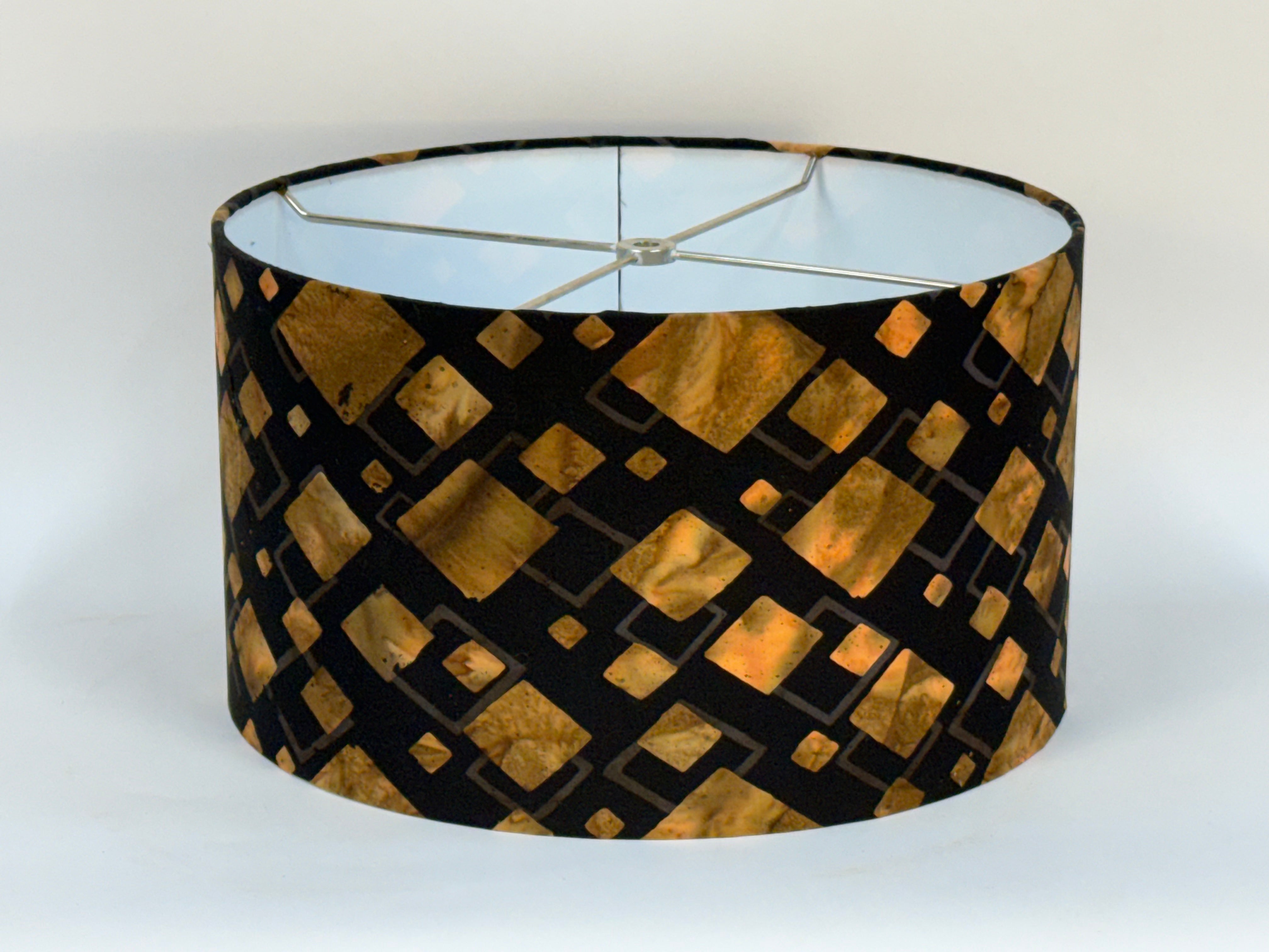 Lampshade with geometric pattern on a white background