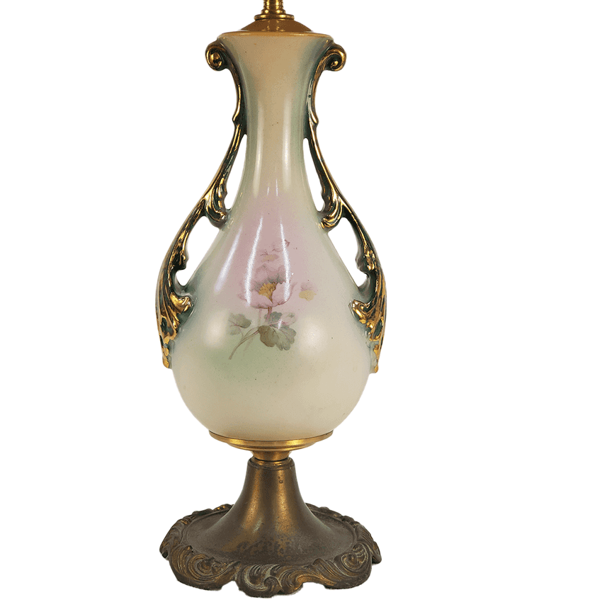 An ornate vintage-style table vase with a pale green and cream glass body, featuring a delicate pink floral illustration, gold-tone decorative side handles, and a matching gold-tone pedestal base.
