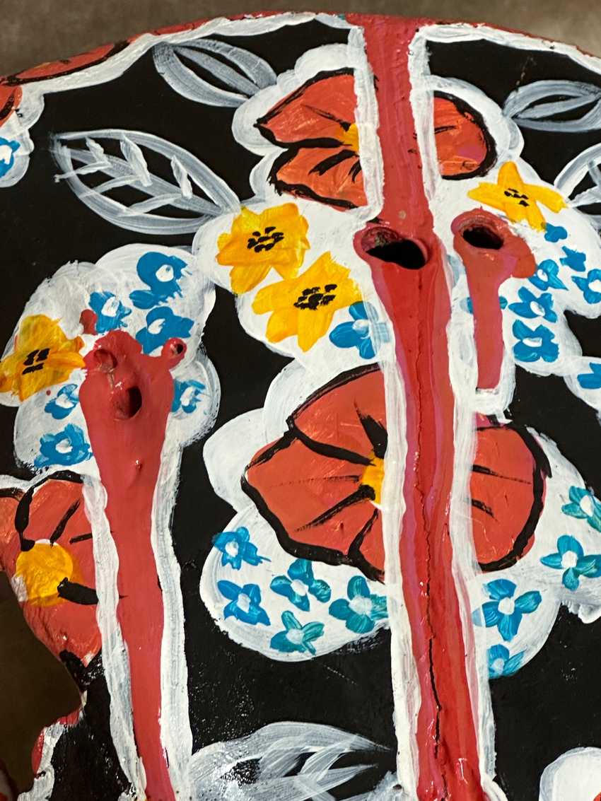Hand Painted Black and Red Floral Cow Skull by Charlie Harris