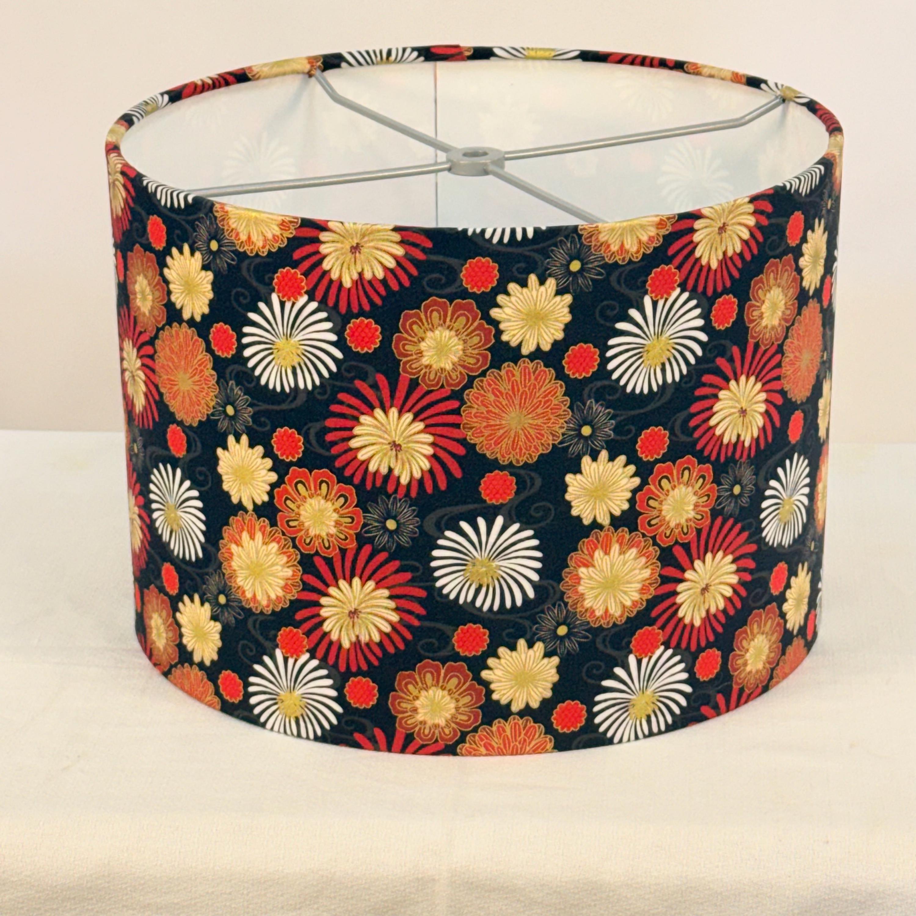 12” Drum Lamp Shade Covered in Red and Gold Fireworks on Black