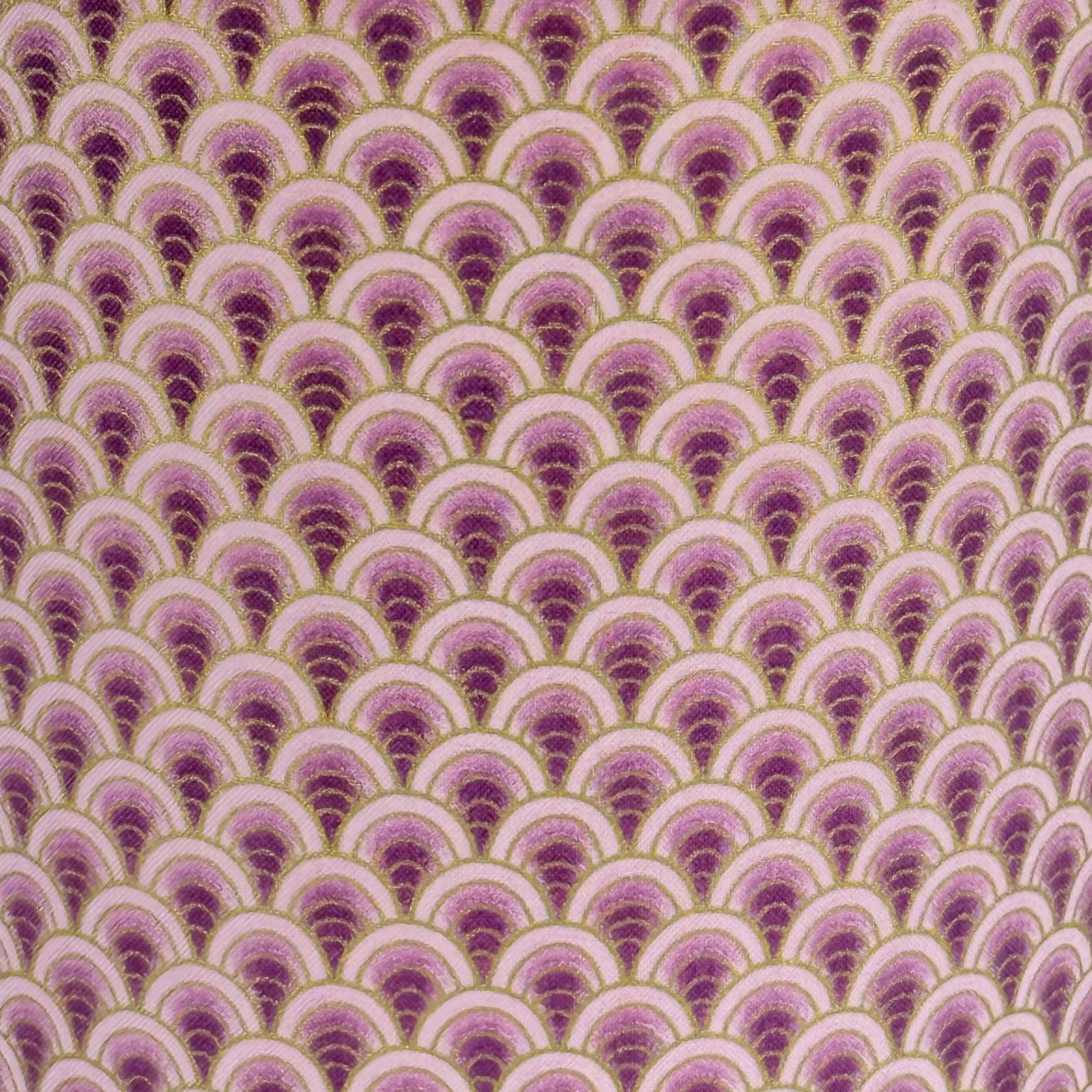 Patterned fabric with a repeating design of pink and purple arches on a green background